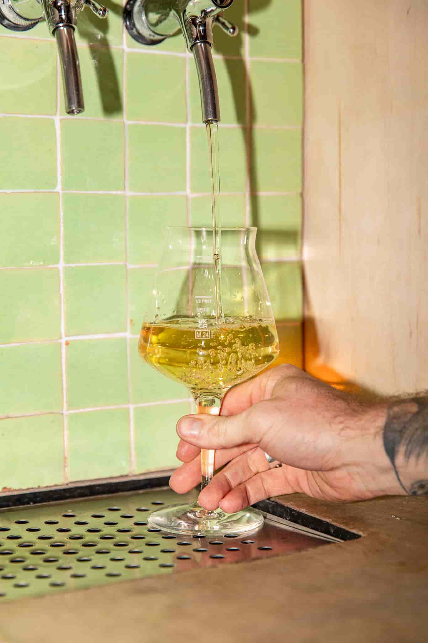 wine glass filling by Ellen Richardson
