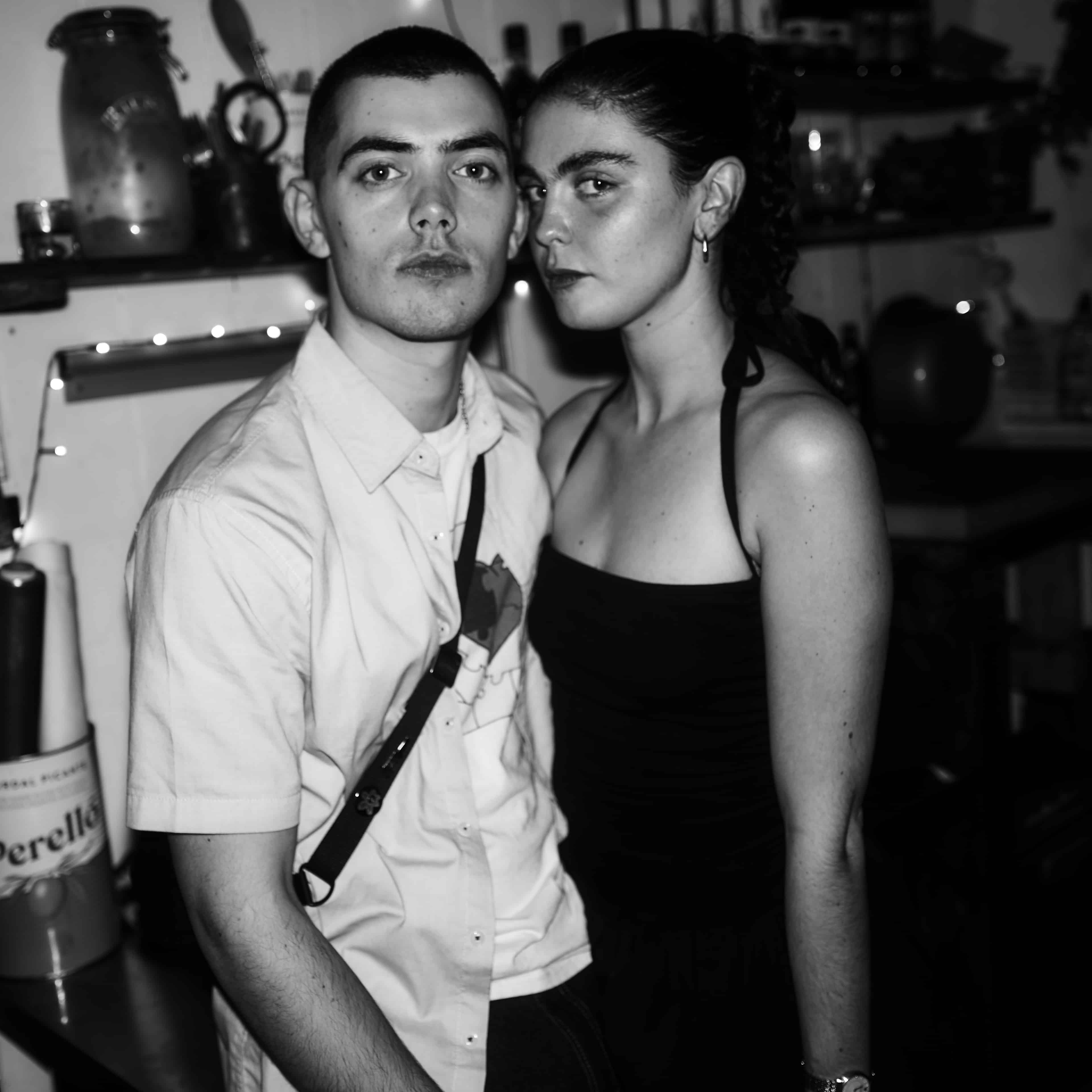 Party in the pub, two people posing for the camera.
